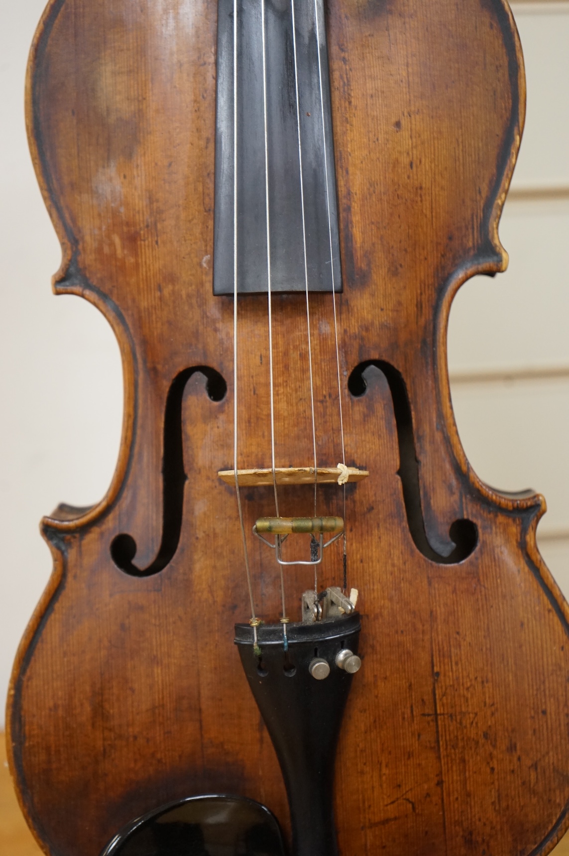 An interesting late 18th century violin, with one piece bird’s eye maple back, unsigned, with two silver fully mounted octagonal bows, one stamped Voight CITES Submission reference, 3XFNUBT7 and Submission reference, RHL